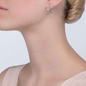 Silver curved nail earring